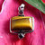 Indian Silver Jewelry Pendant • Tiger's-eye and Garnet